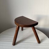 Varnished wooden stool with three legs