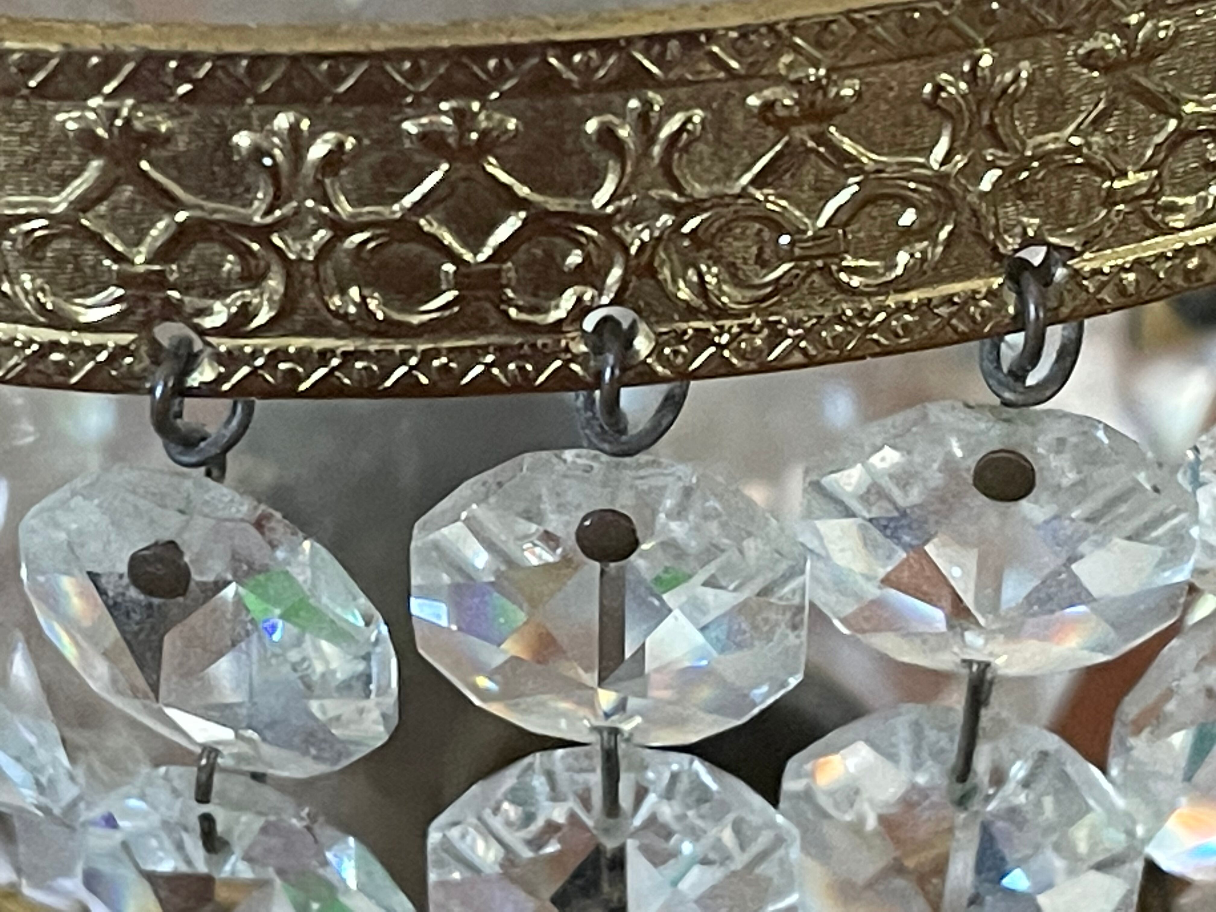 Pair of brass sconces and tassels