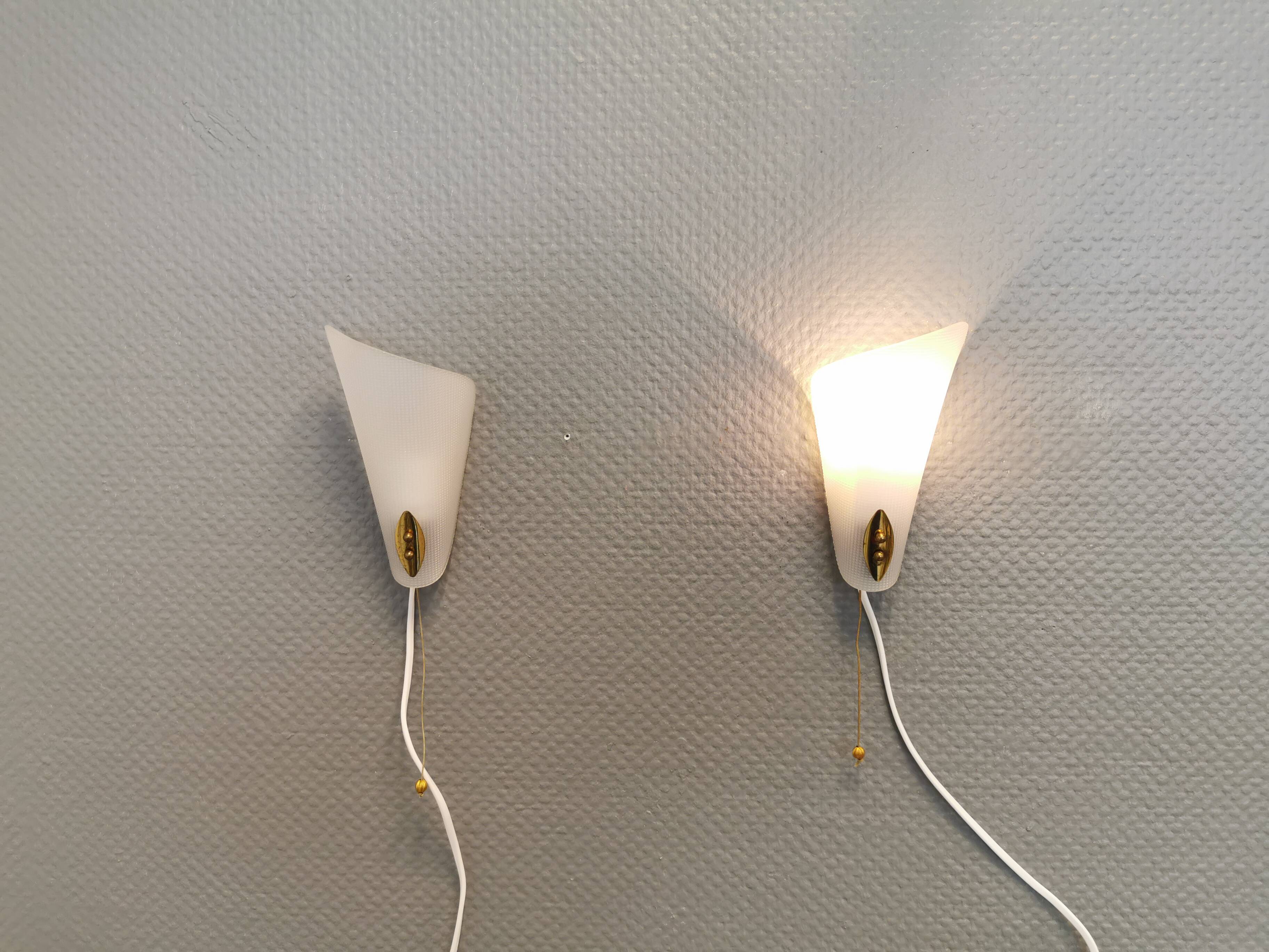 Two small Art Deco wall lights.