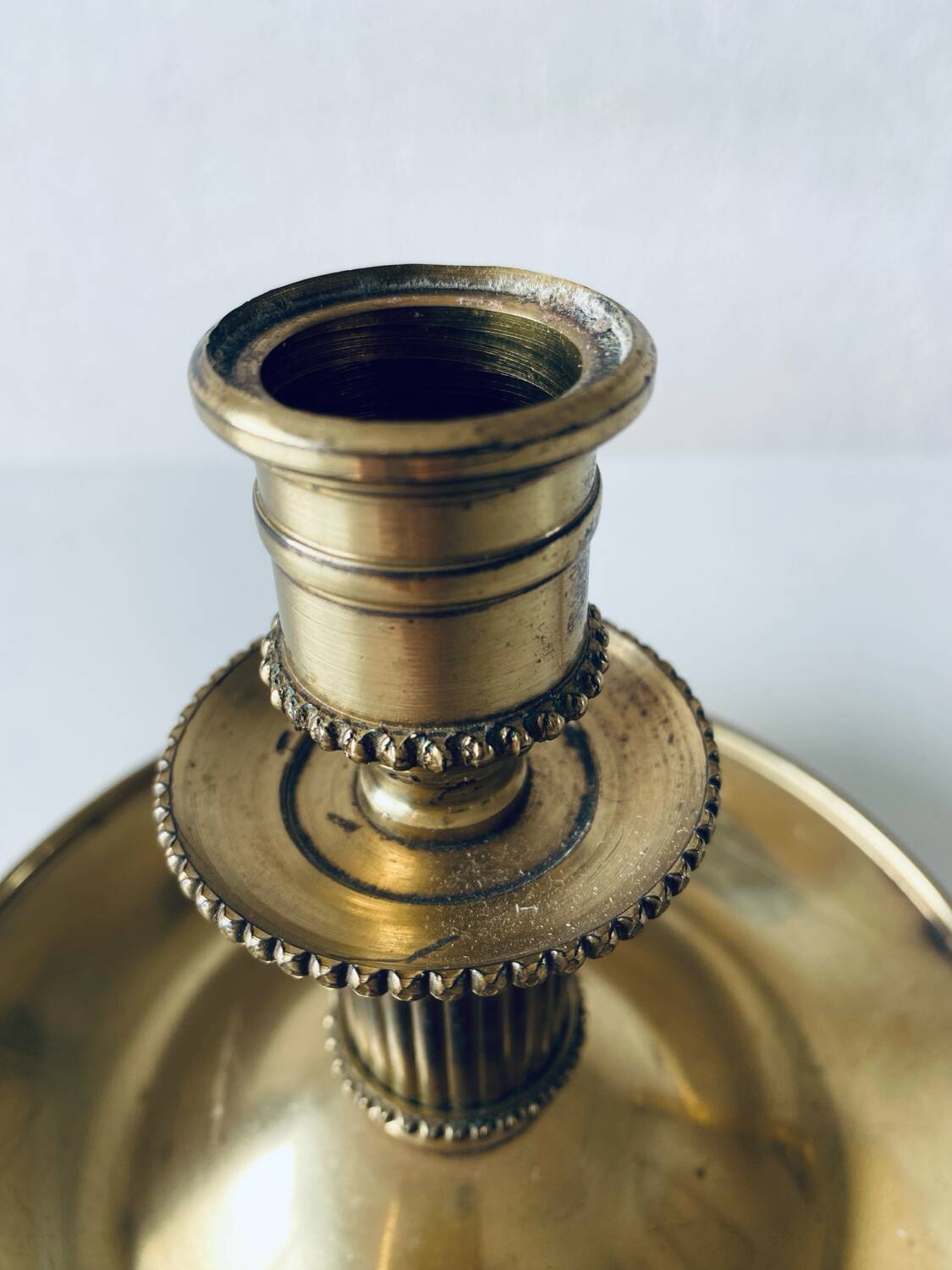Candle holder with brass handle
