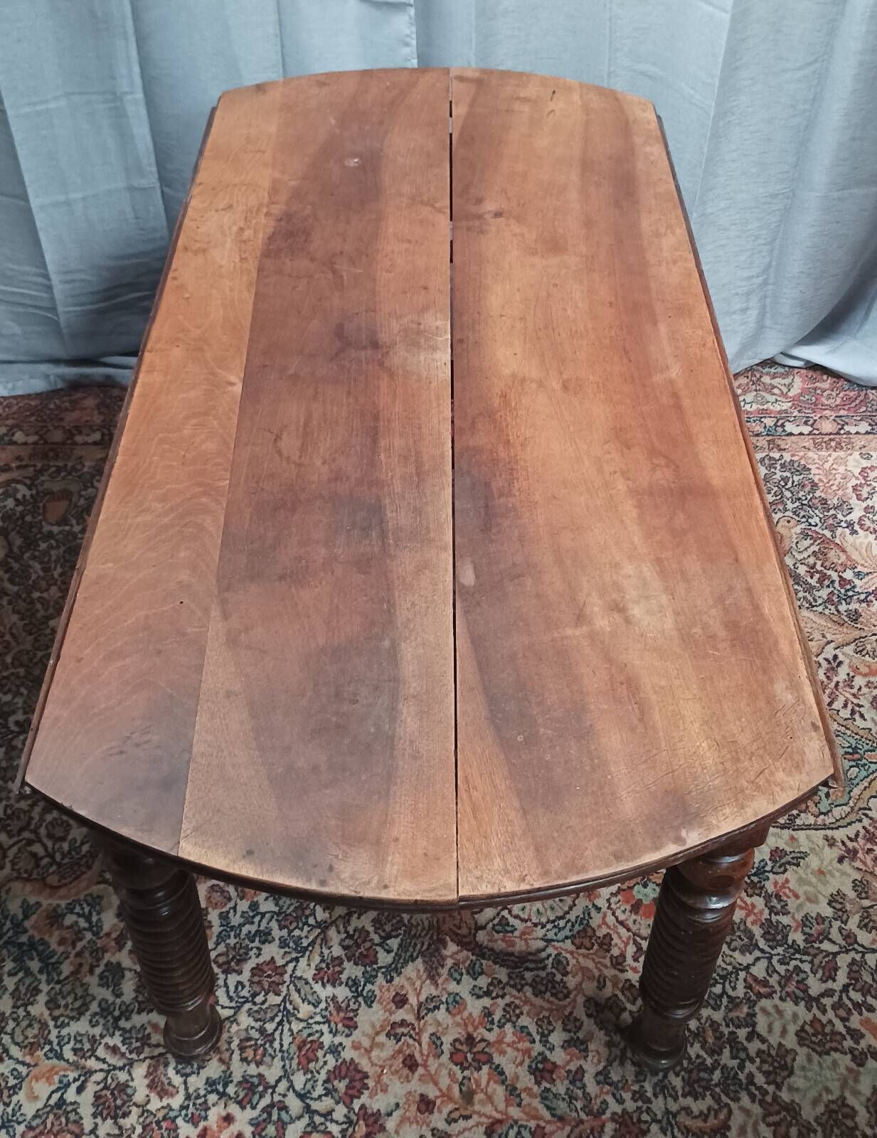 19th-century Louis Philippe walnut drop-leaf table.