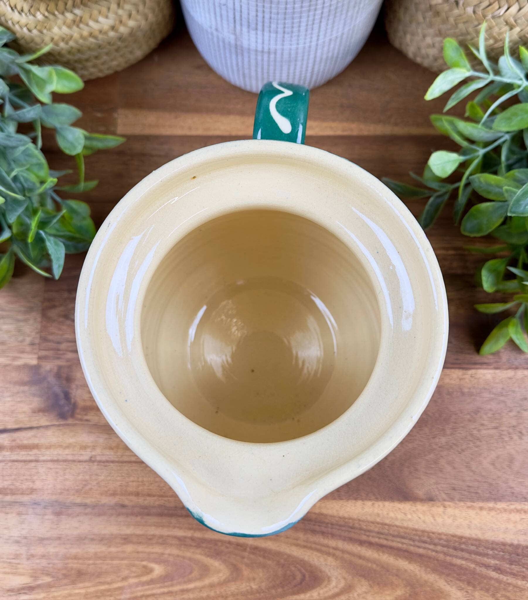 Green glazed ceramic jug