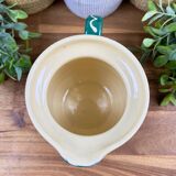 Green glazed ceramic jug