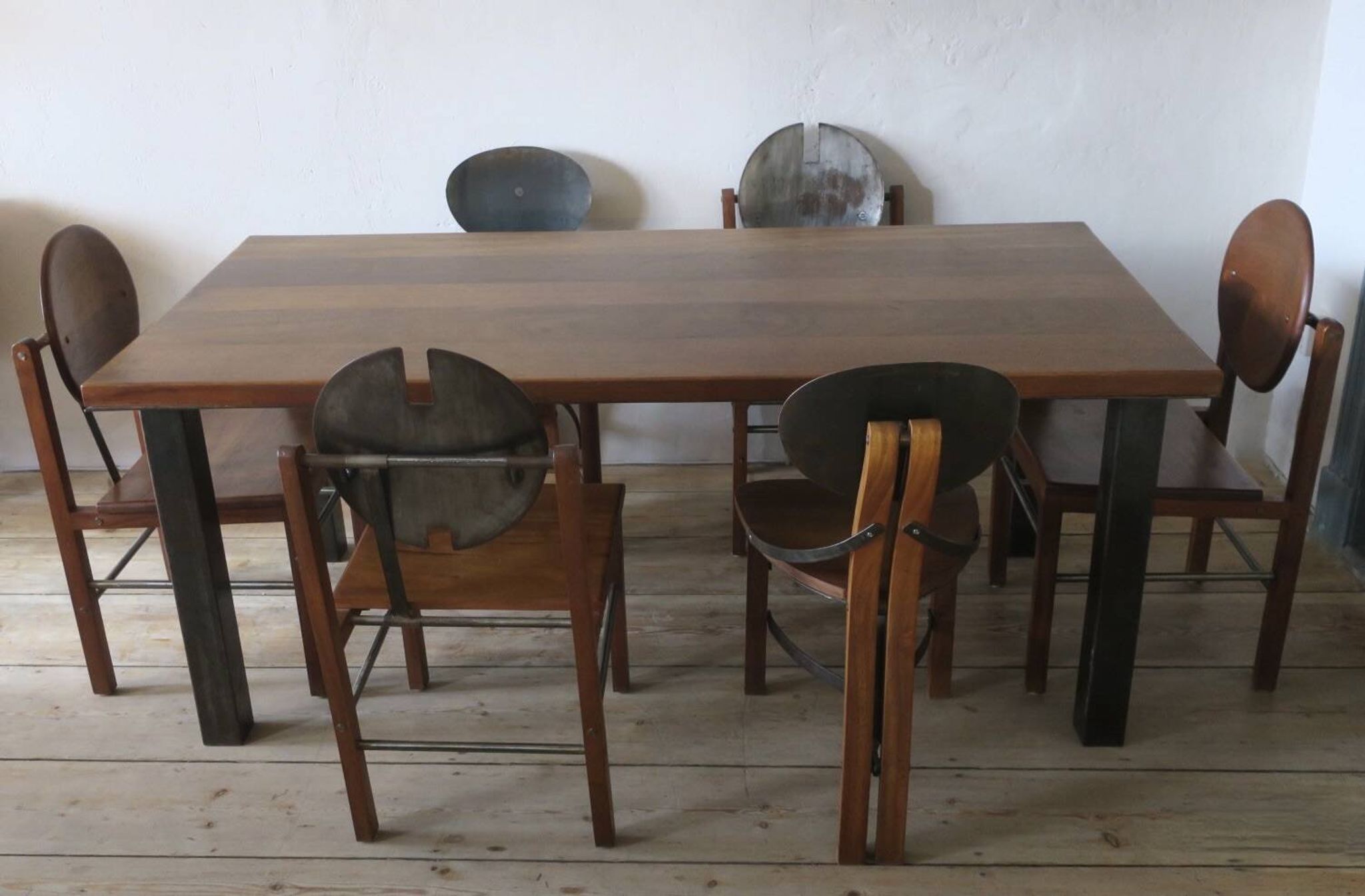Brutalist 6 chairs and dining table in teak and patinated steel, 1960s