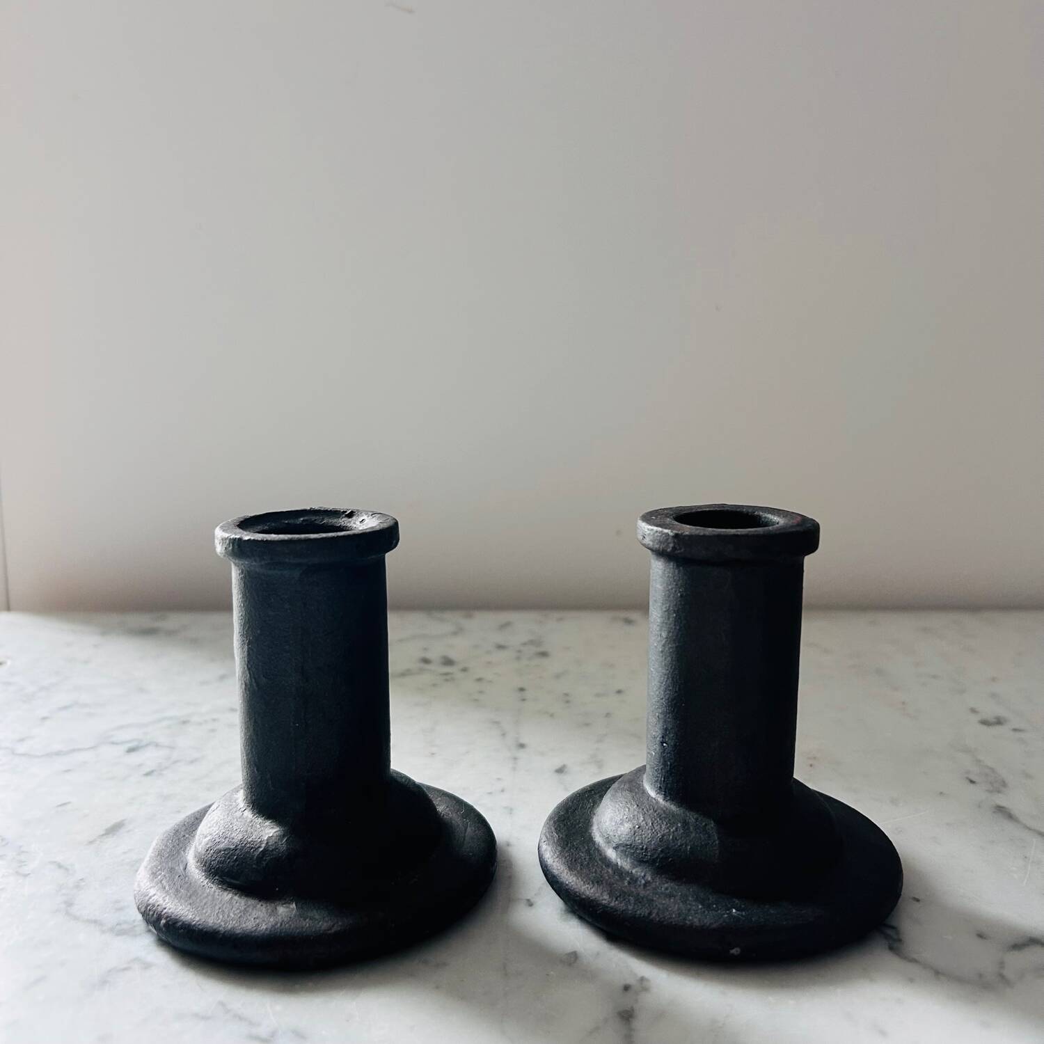 Brutalist cast iron candlestick holders