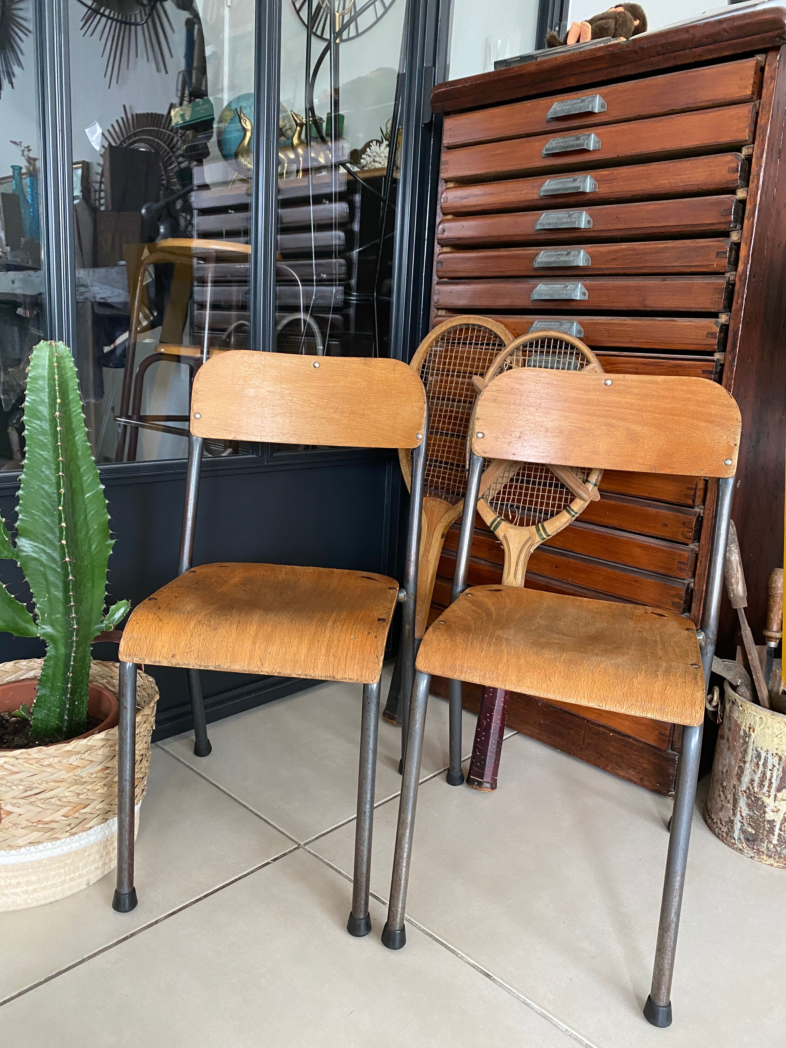 Pair of wooden and metal children's chairs