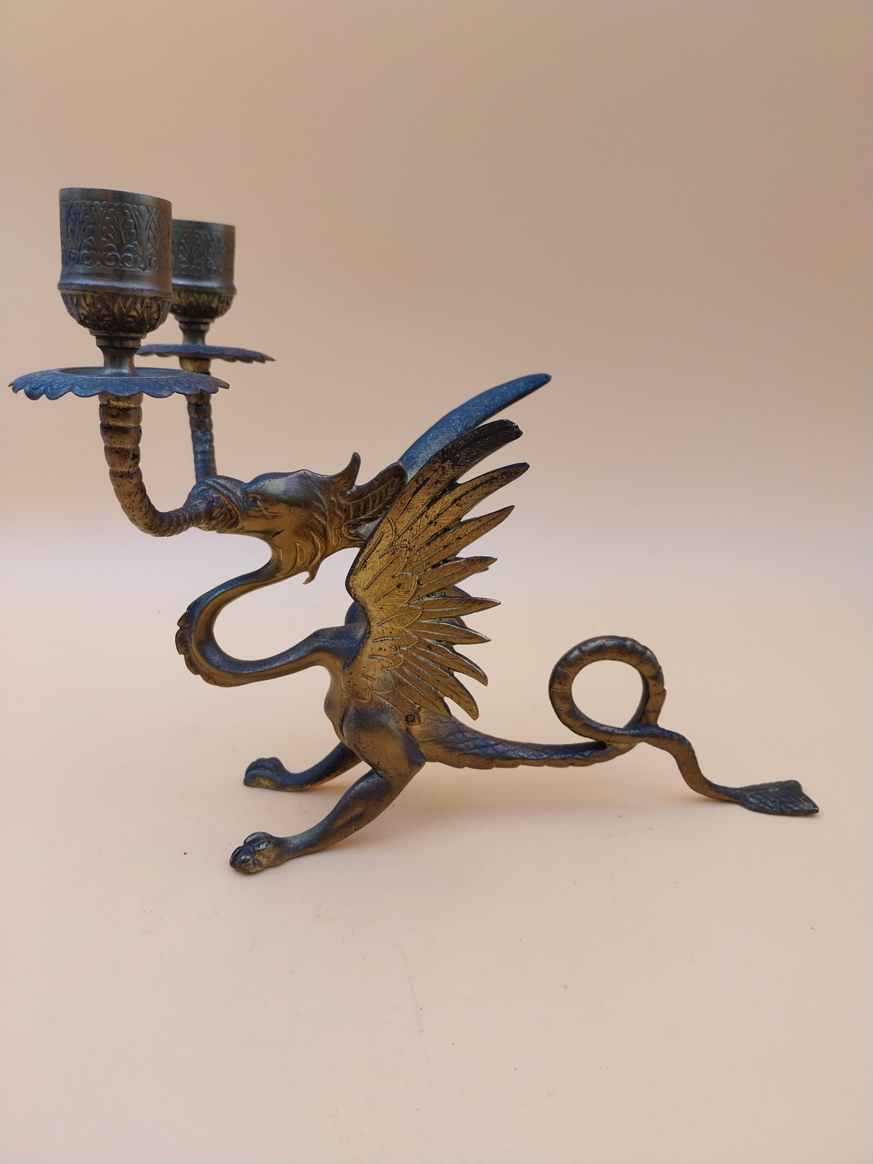 Pair of bronze candlesticks with chimera dragons