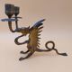 Pair of bronze candlesticks with chimera dragons
