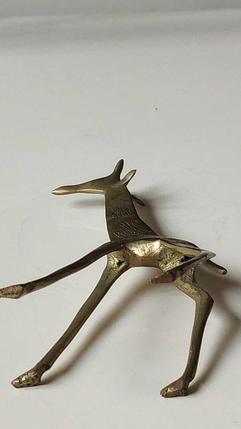African giraffe figurine in polished brass. high 20 cm