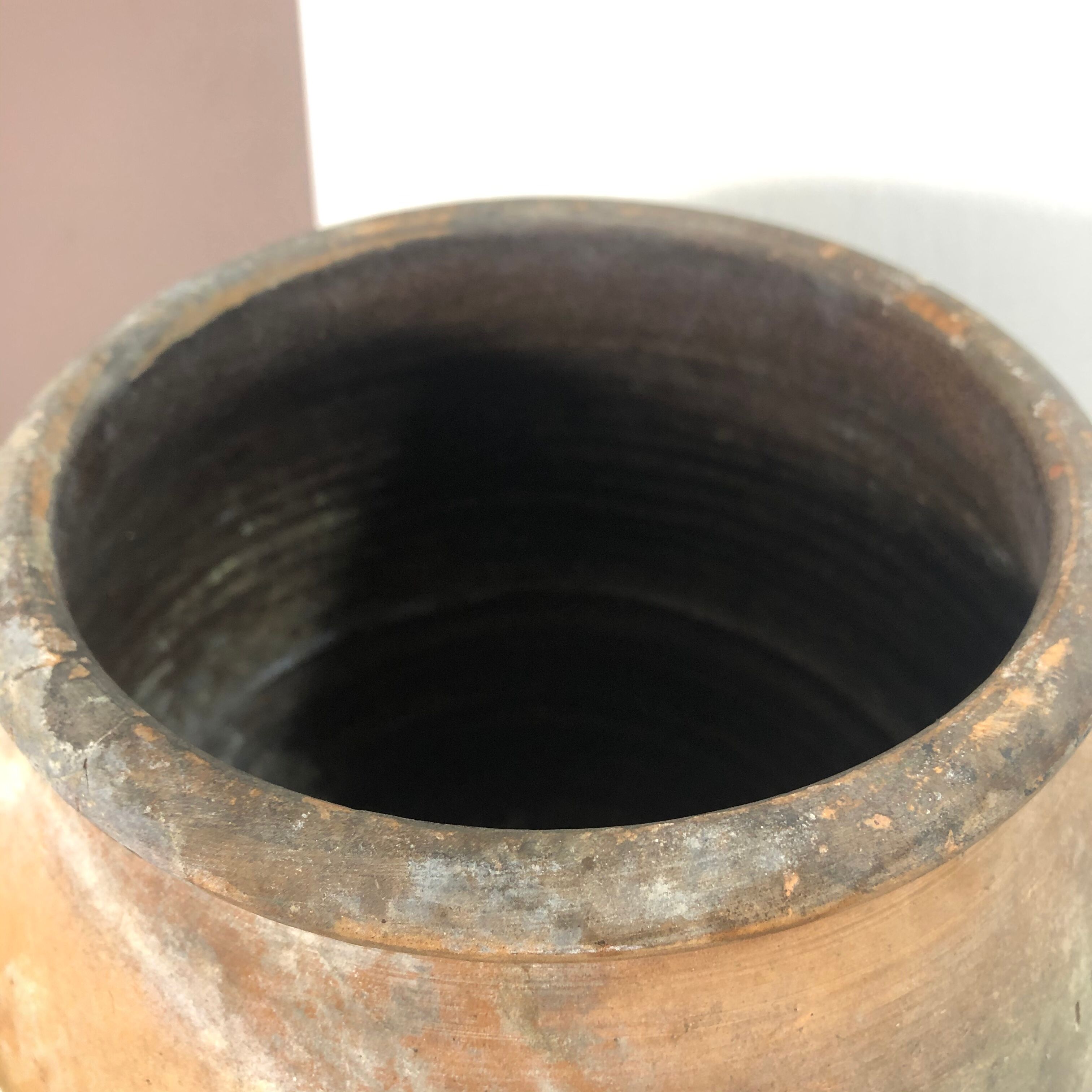 Old terracotta salt pot