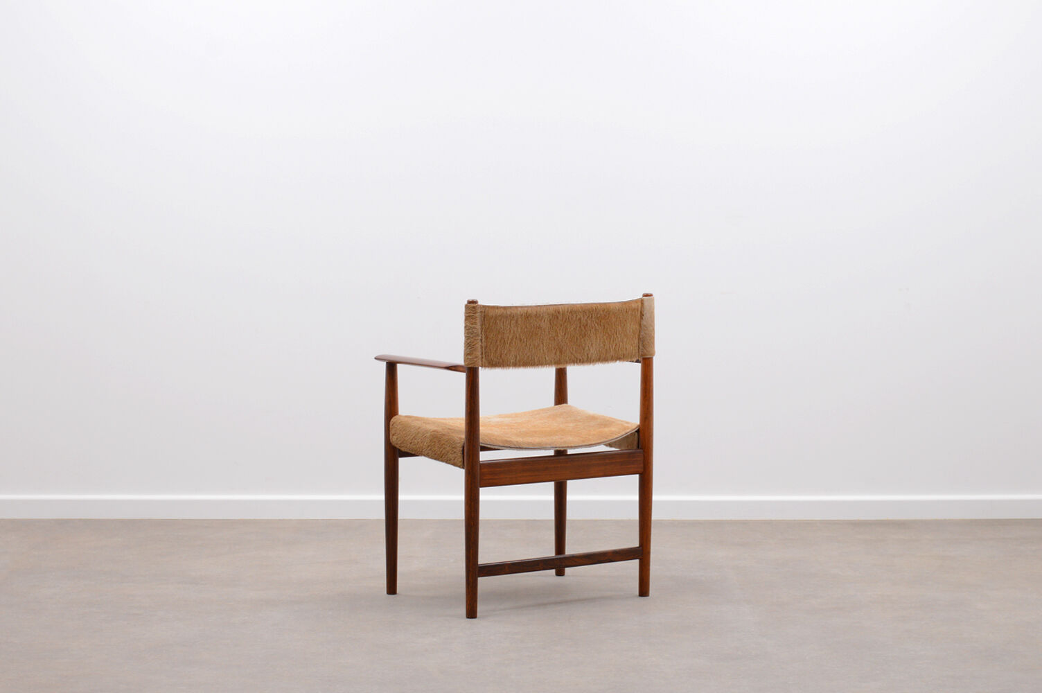 Rosewood and cow hide chair by Kurt Østervig for Sibast, 60s Denmark.