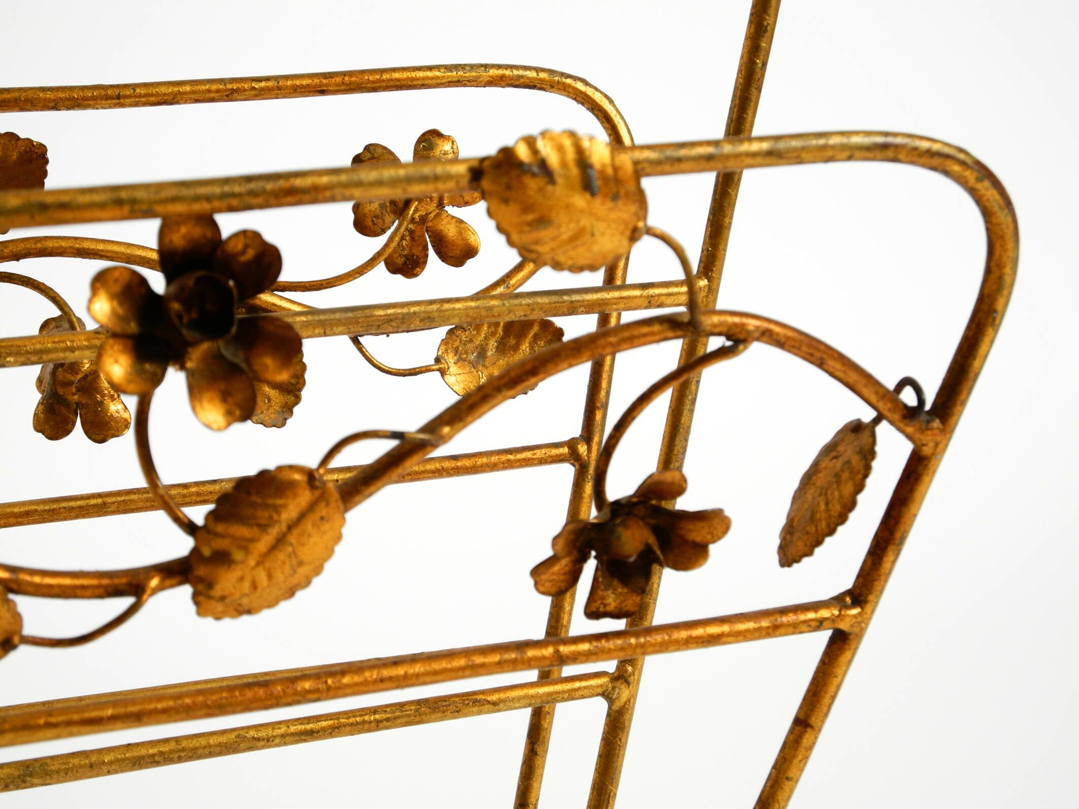 Extraordinary mid-century newspaper and magazine rack with a gilded metal