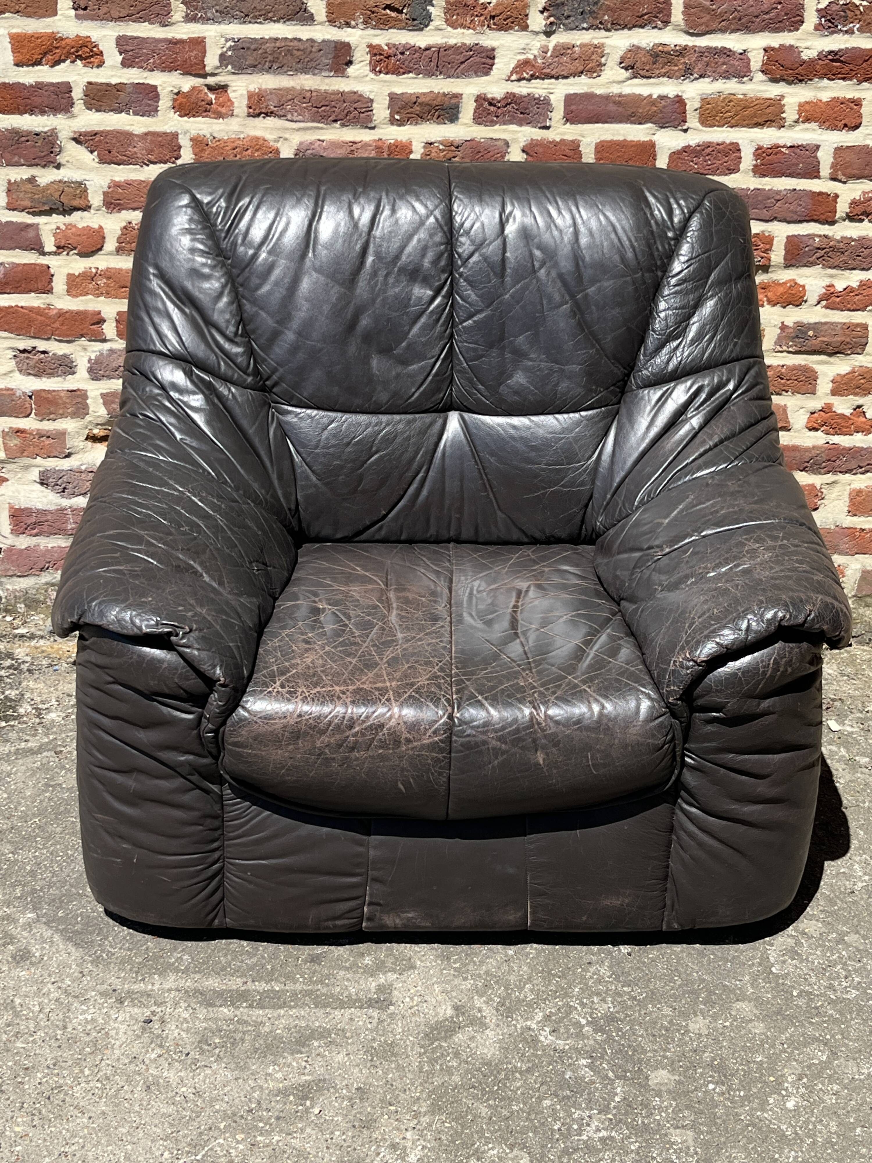 Pair of patinated leather club armchairs
