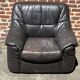 Pair of patinated leather club armchairs