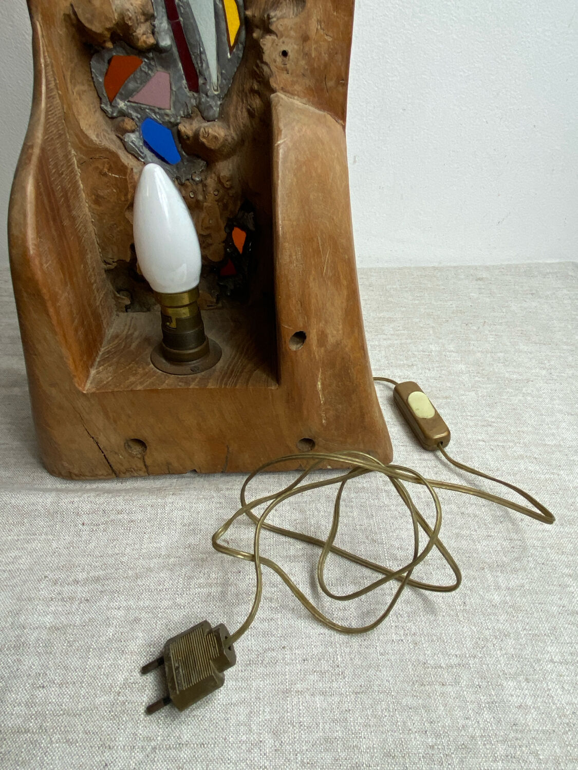 Carved wooden lamp and stained glass