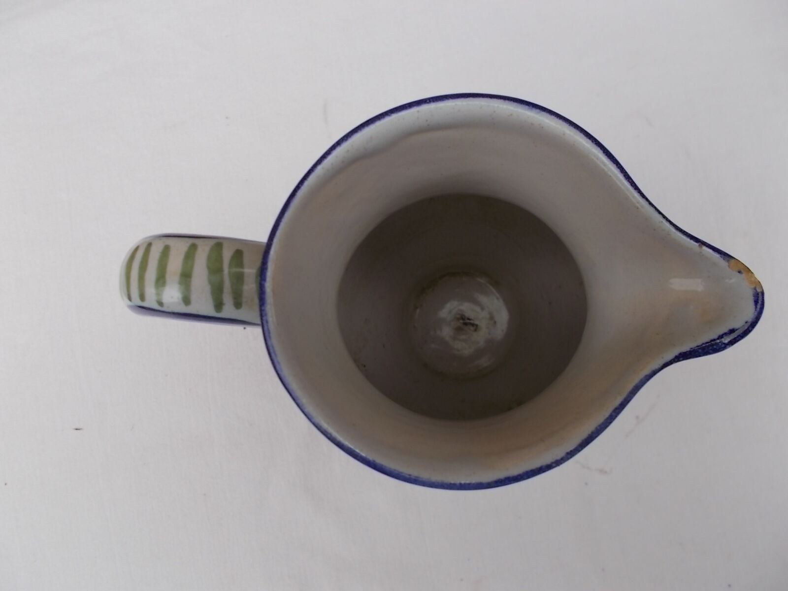 Decorated earthenware jug