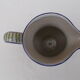 Decorated earthenware jug