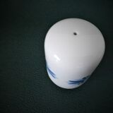 Porcelain pepper shaker with blue patterns