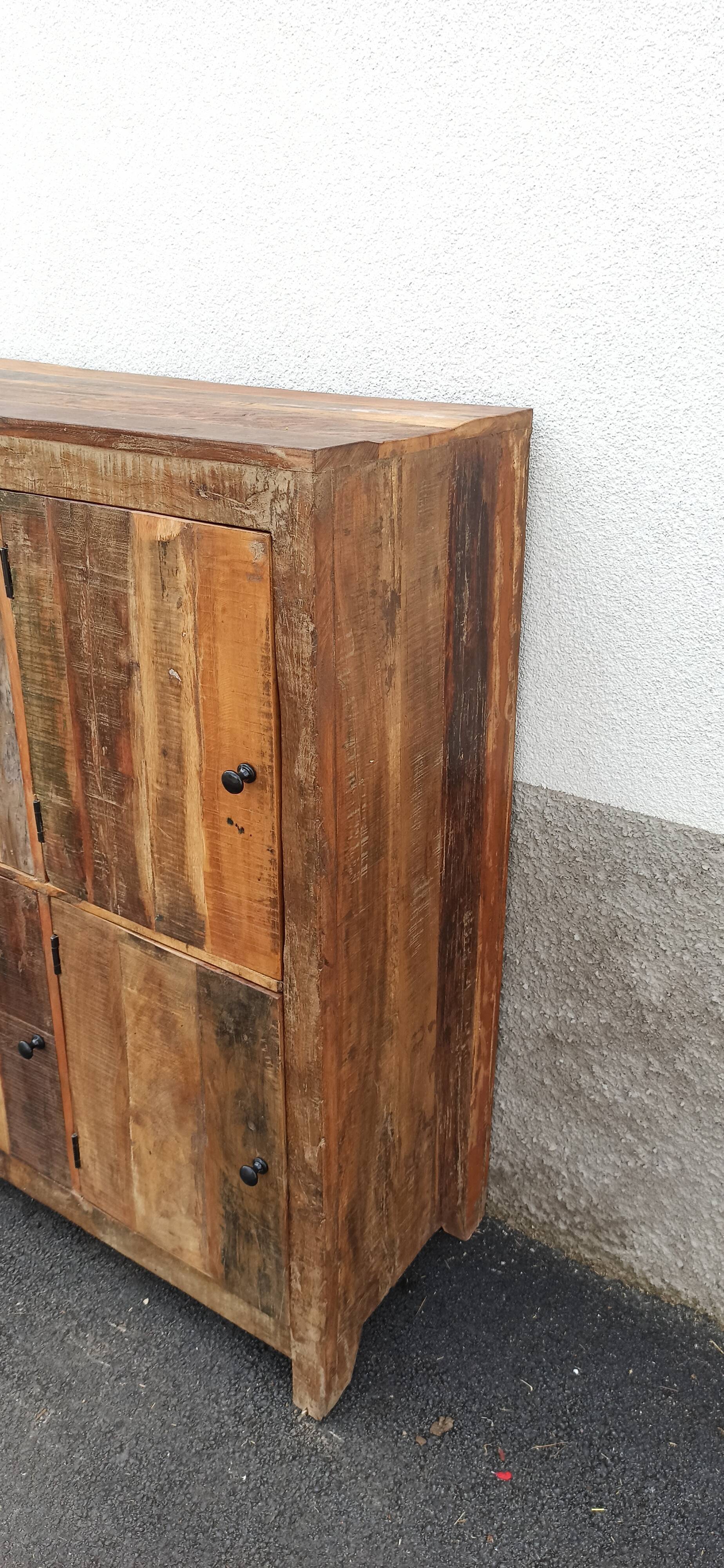 Old wooden cabinet. 8 doors.