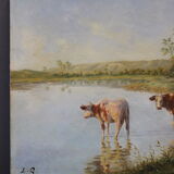 Oil on canvas depicting cows at the edge of the pond circa 1900