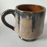 Fleur-de-lis glazed earthenware mug