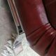 Couple de fauteuil en simili cuir rouge bordeaux, annees 70