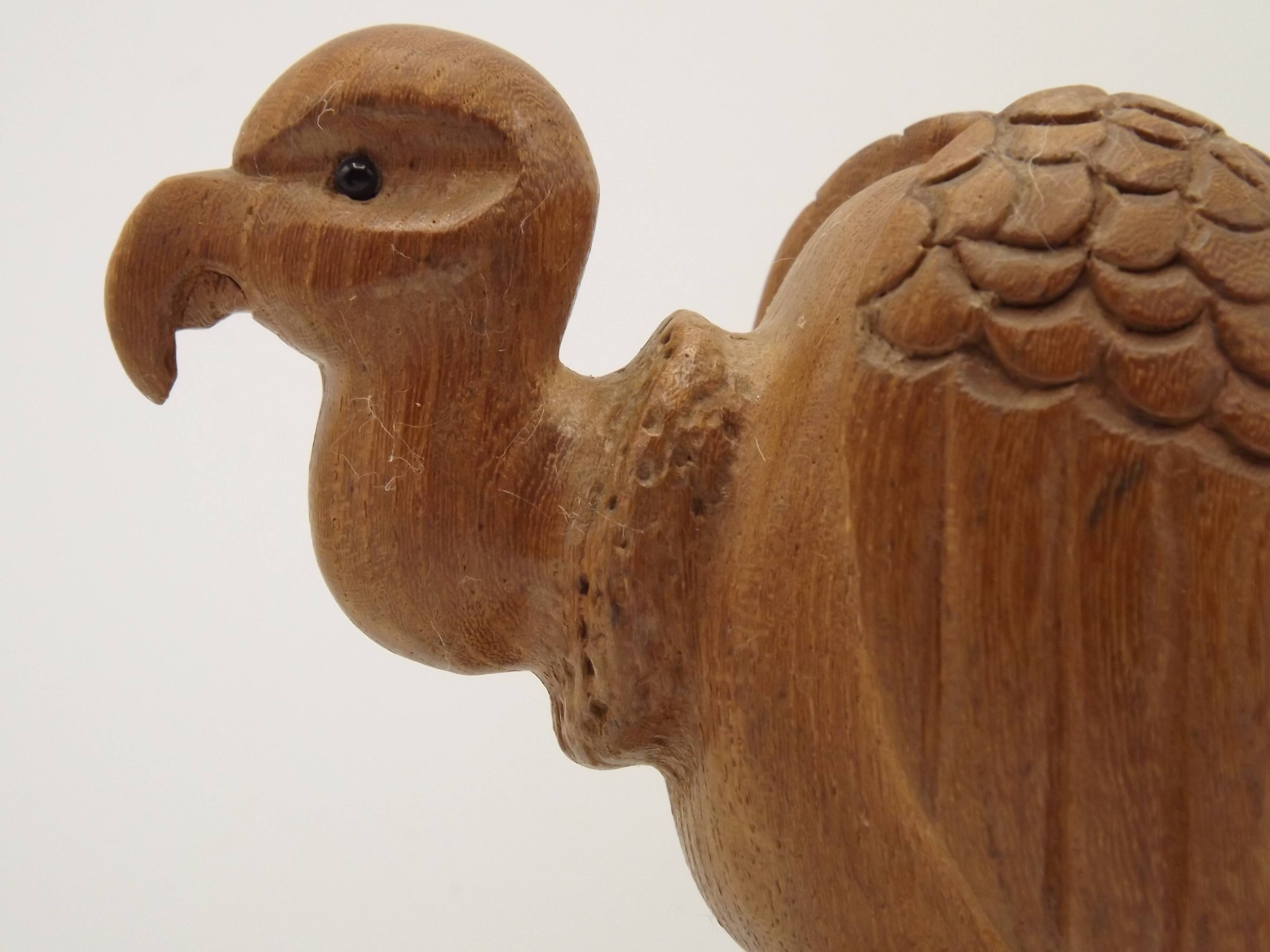 Paire de serre-livres en bois figurant des vautours