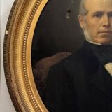 Oil on canvas portrait of a man, late 19th century, oval frame gilded with gold leaf.