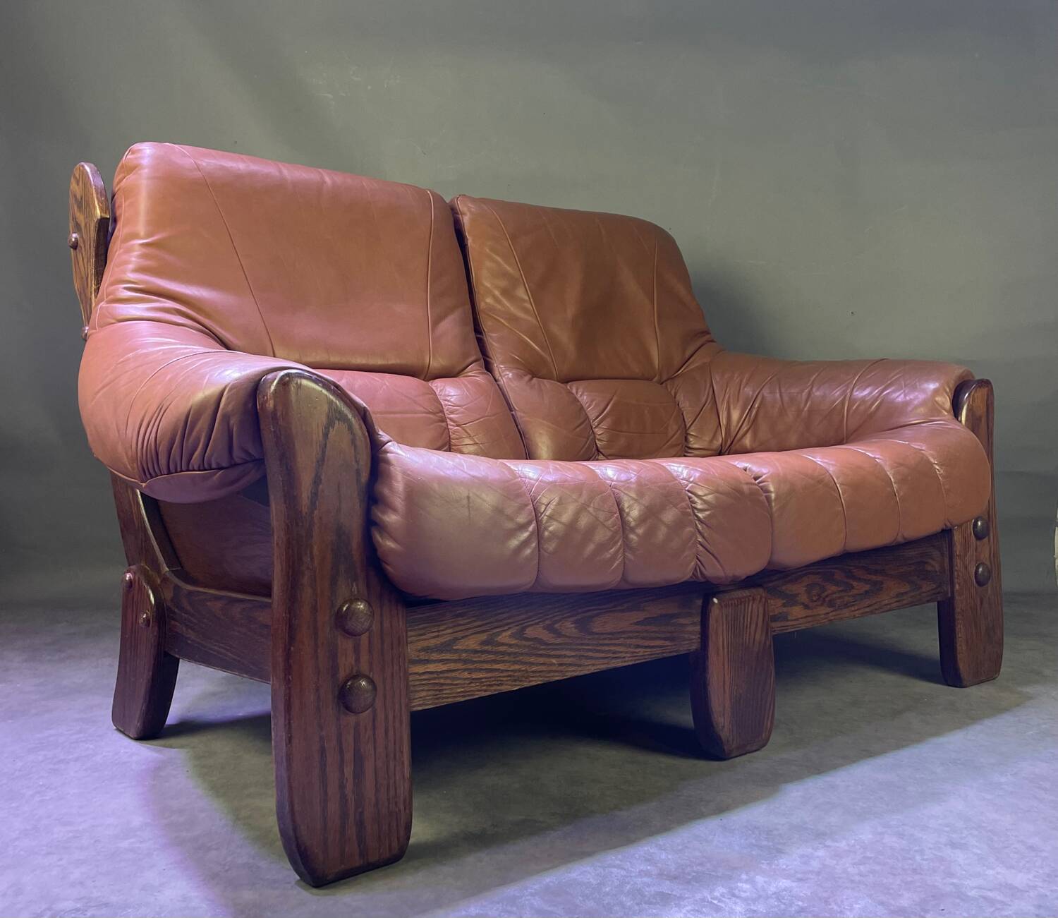 Brutalist style wood and leather sofa