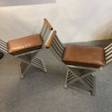 Pair of curule chairs designed by John Vesey, 1958, USA, brushed aluminum, walnut and leather