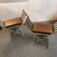 Pair of curule chairs designed by John Vesey, 1958, USA, brushed aluminum, walnut and leather