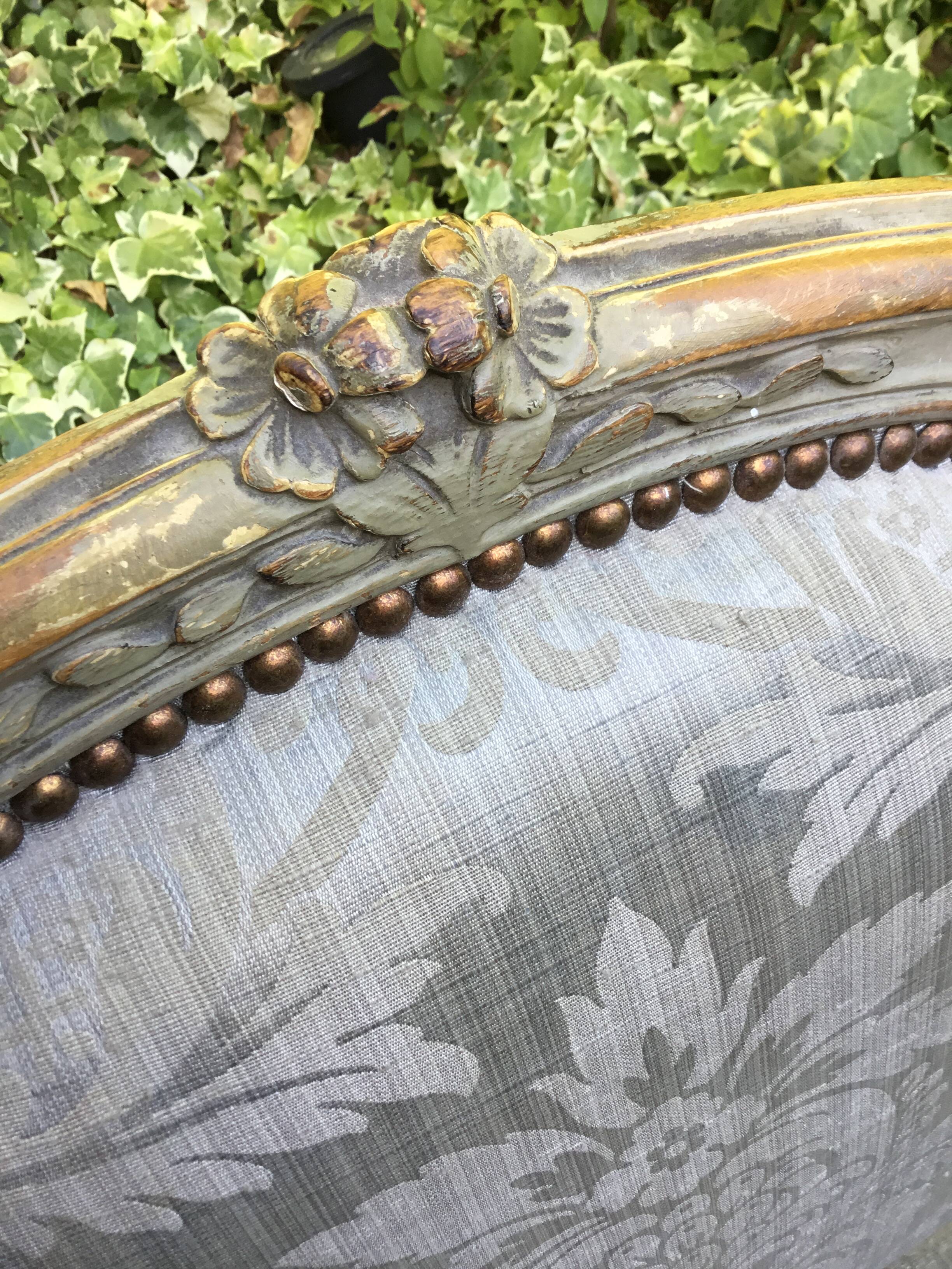 Pair of Louis XV style armchairs in grey lacquered wood.