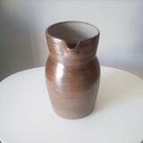 Vintage pitcher in glazed sandstone