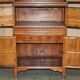 Antique Chinese armoire hand-carved around 1880 with country-style handles.