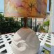 Vintage antique lamp with a stone base.