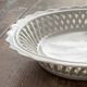 Openwork, woven earthenware plate