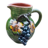Terracotta pitcher glazed in grape slip signed HB