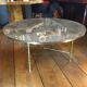 Table basse en bronze doré, verre façon miroir doré, circa 1940