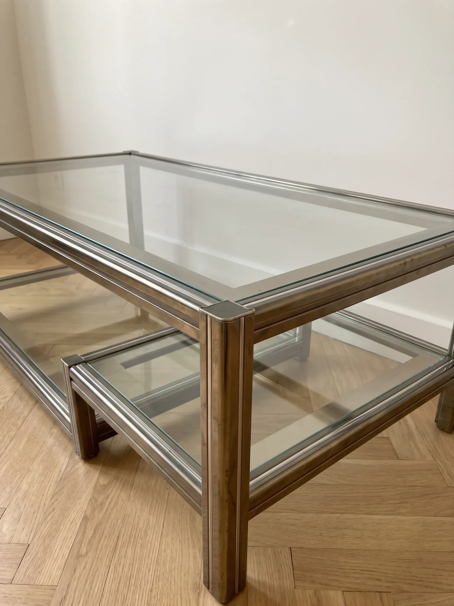 1970s Roméo Rega coffee table in glass and chrome metal.