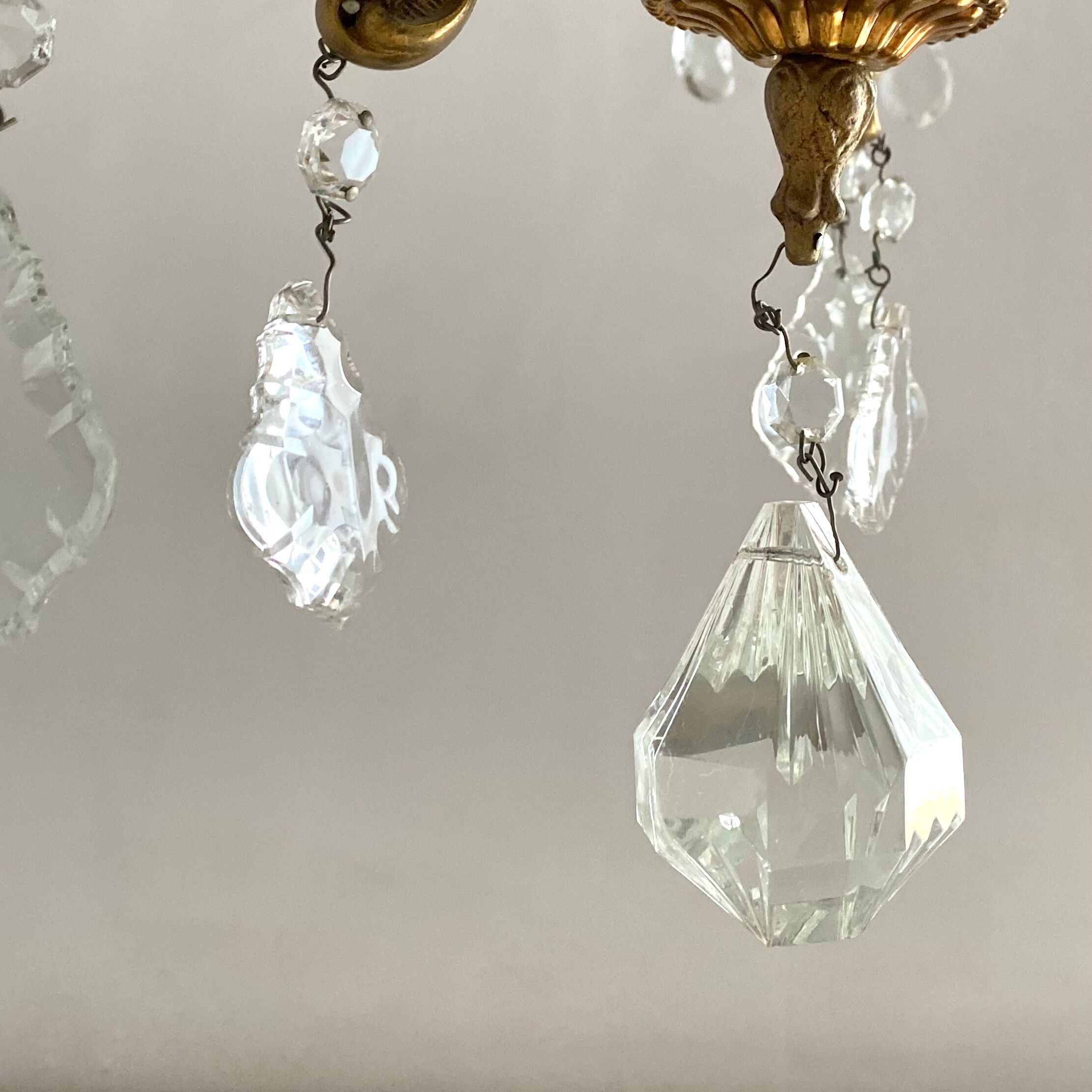 Chandelier with tassels and brass