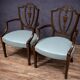 Paire de fauteuils en bois sculpté de style néoclassique, début XIXe