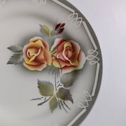 3 Digoin Sarreguemines Adèle plates in grey, yellow, and burgundy.