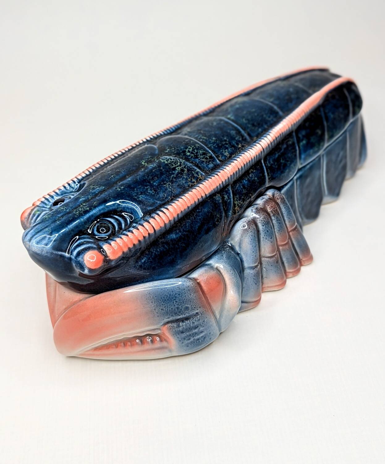 Lobster barbotine signed Michel Caugant midnight blue / coral