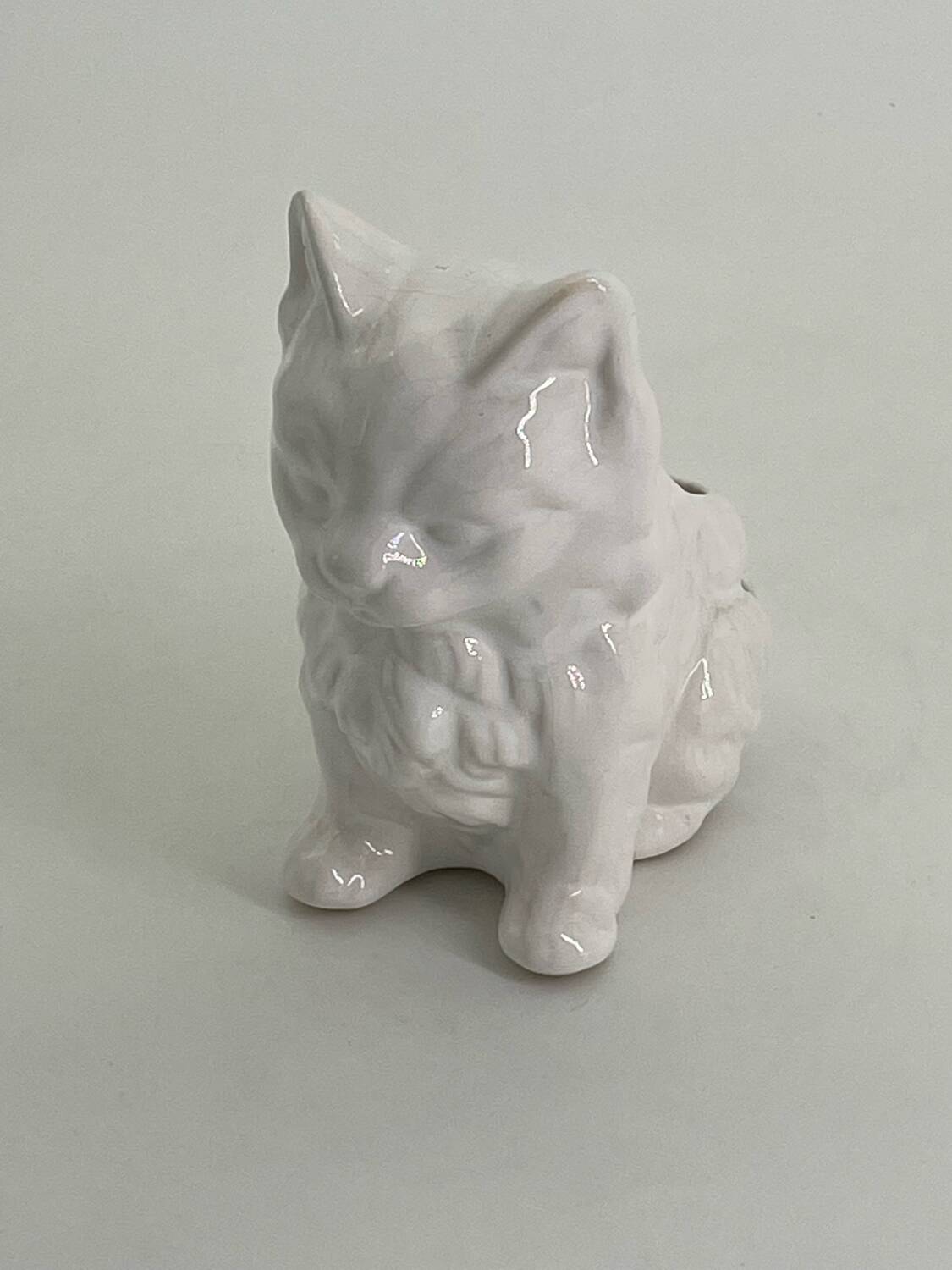 Vintage ceramic pot holder in the shape of a cat