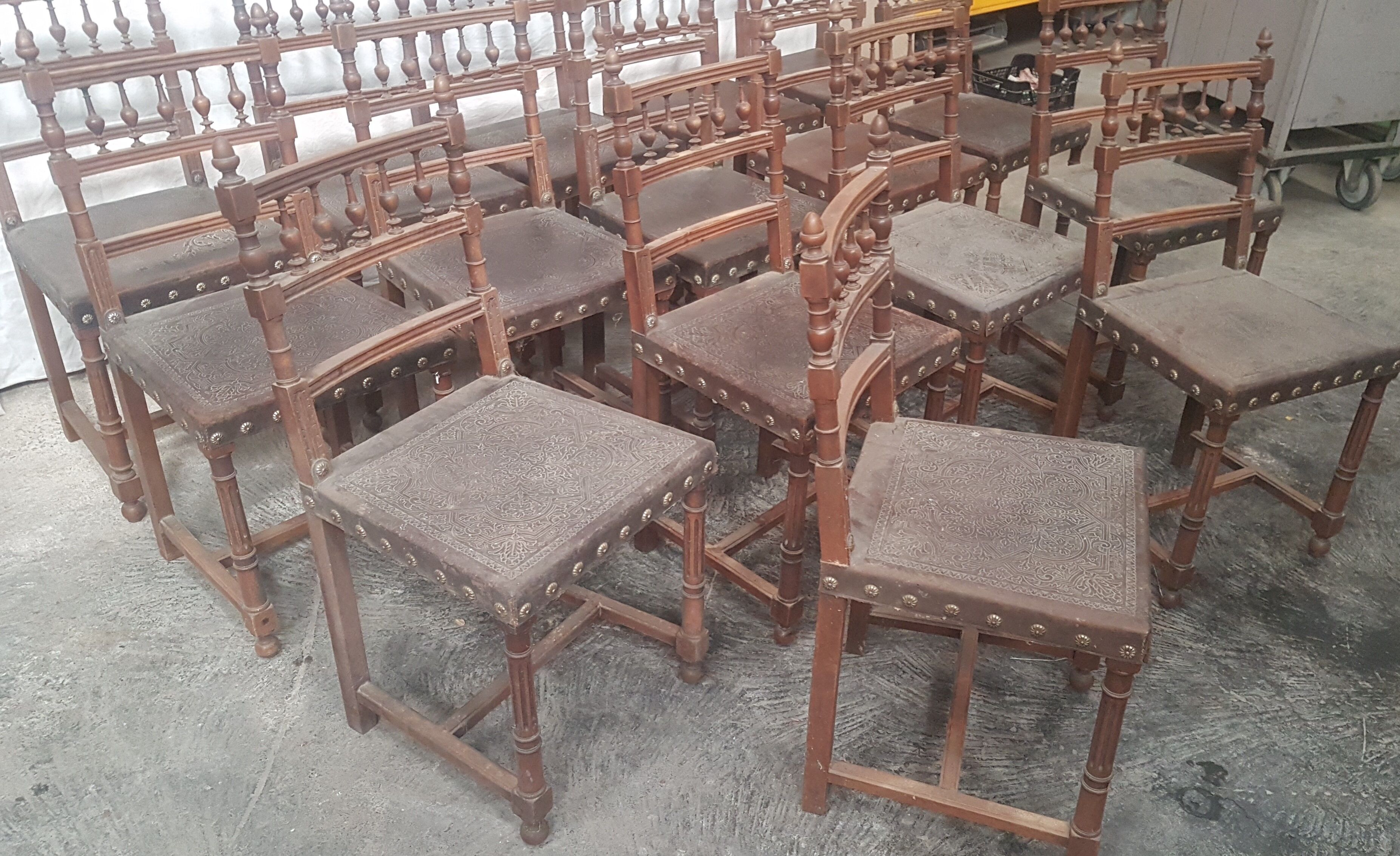 A set of 16 henri 2 style chairs in repelled leather 2 patterns
