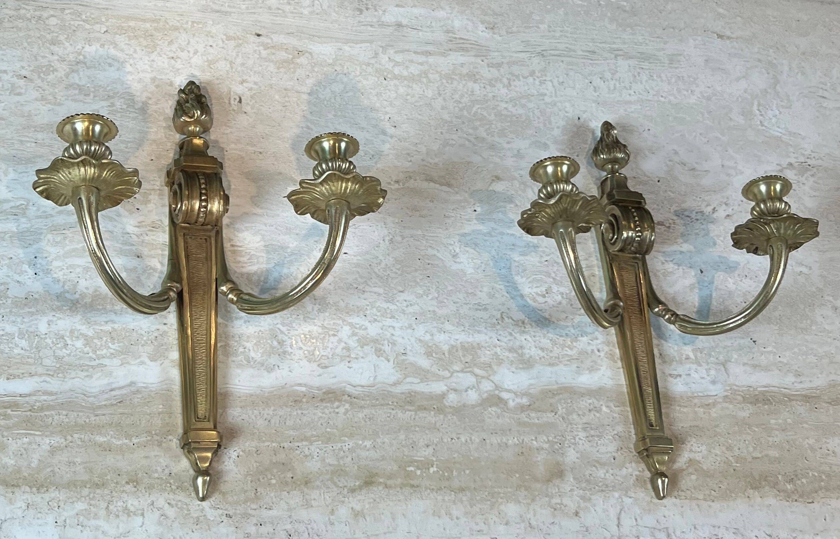 Pair of Louis XVI style bronze wall sconces