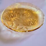 Glass plate decorated with suns, 1980.