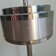 Vintage chrome metal floor ashtray with integrated tray.