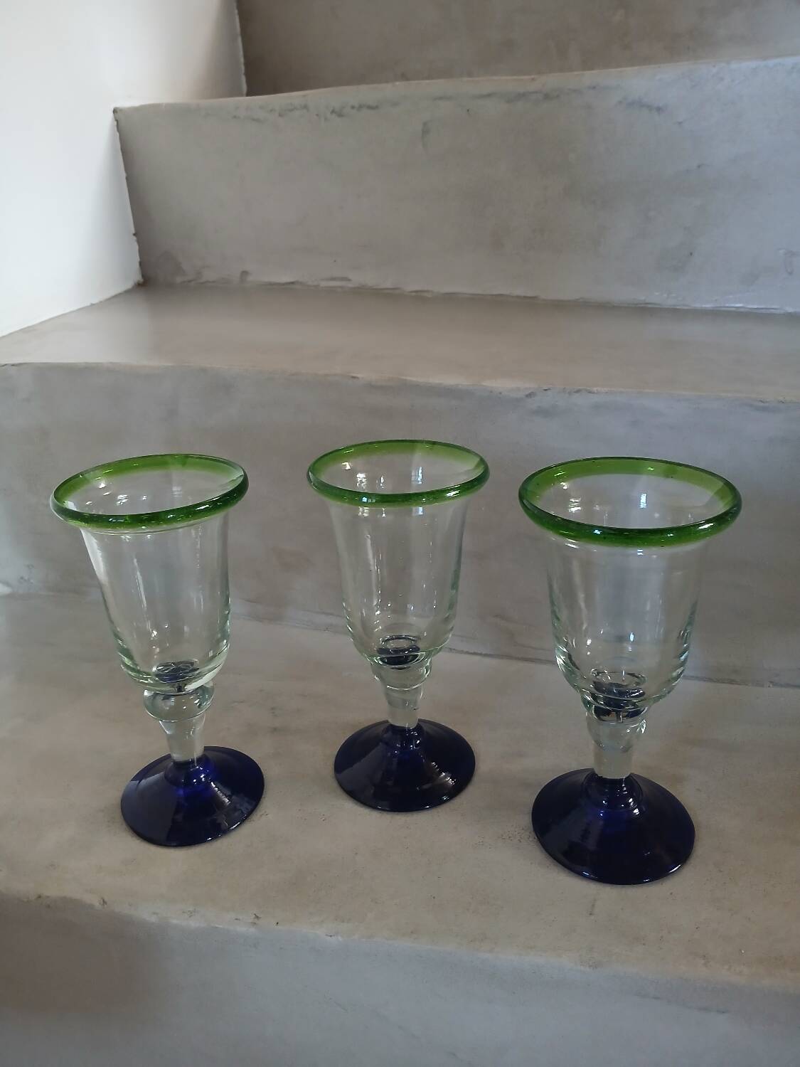 3 stemmed glasses in bubble and blown glass