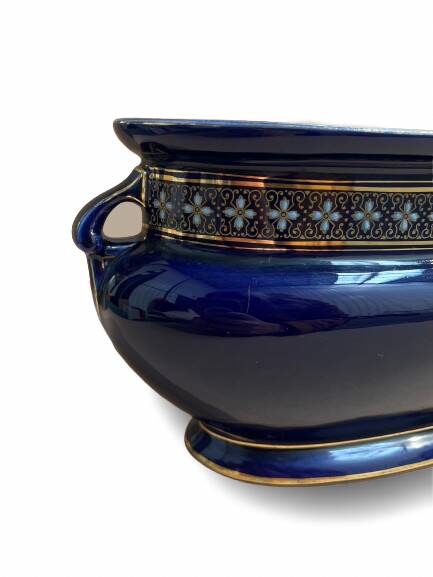 Blue earthenware planter decorated with gold motifs